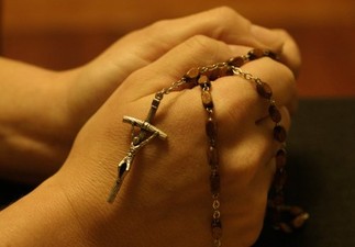 mani con rosario